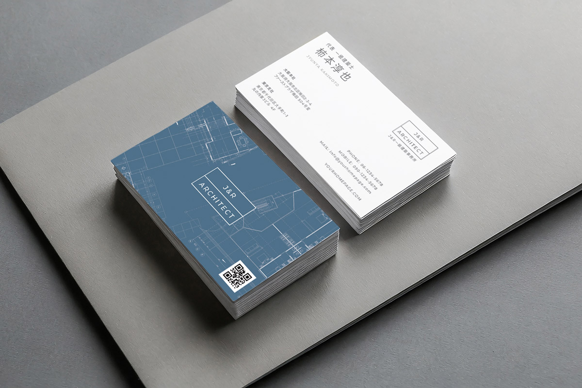 一級建築士事務所の名刺デザイン実績|ブループリントを採用した名刺のスタック写真(ポートフォリオ用)